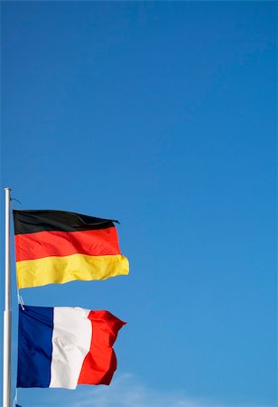 Flags of Germany and France nation on the blue sky Stock Photo - Budget Royalty-Free & Subscription, Code: 400-04948757