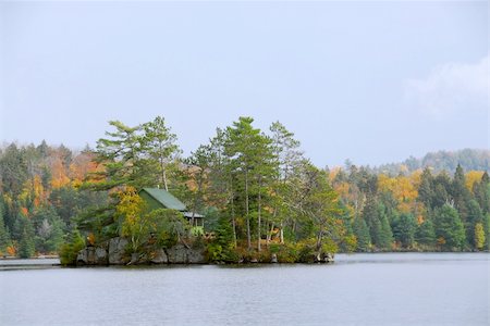 simsearch:400-04909150,k - Wooden cozy cabin on a small island on a scenic lake Stock Photo - Budget Royalty-Free & Subscription, Code: 400-04940245