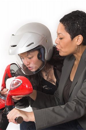 scooter with white background - couple girls talking on  scooter over white background Stock Photo - Budget Royalty-Free & Subscription, Code: 400-04941148