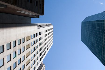 simsearch:400-04671558,k - Modern skyscrapers against a bright blue sky Foto de stock - Super Valor sin royalties y Suscripción, Código: 400-04941518