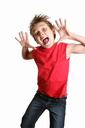 simsearch:400-06481645,k - Child mid jump with a crazy happy face Stock Photo - Budget Royalty-Free & Subscription, Code: 400-04954725