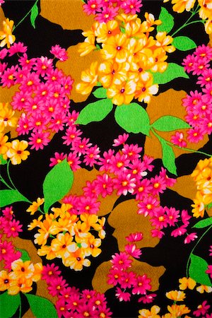 Close-up of vintage fabric with vibrant pink and yellow flowers printed on polyester. Photographie de stock - Aubaine LD & Abonnement, Code: 400-04956272