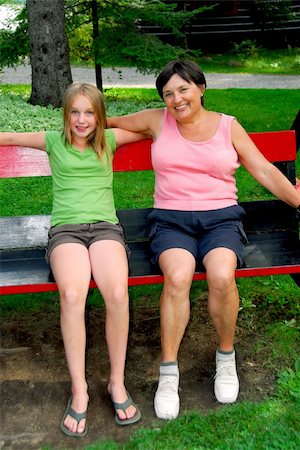 Grandmother and granddaughter on swings Stock Photo - Budget Royalty-Free & Subscription, Code: 400-04957729