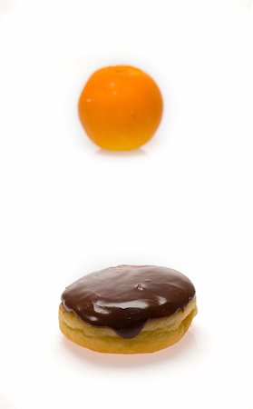 simsearch:400-05106591,k - food choices showing a donut and fruit Stock Photo - Budget Royalty-Free & Subscription, Code: 400-04958042