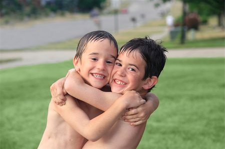 Boys Playing Outside in the Water Stock Photo - Budget Royalty-Free & Subscription, Code: 400-04950012