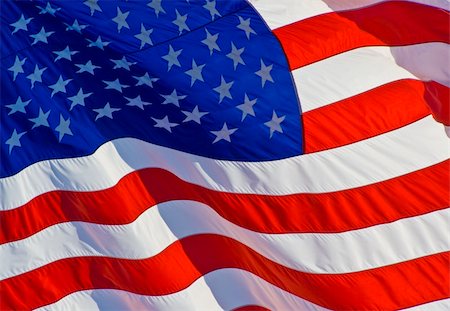 simsearch:400-06086537,k - Tilted stars and stripes flying in the wind on nice background for a patriotic display Stock Photo - Budget Royalty-Free & Subscription, Code: 400-04950720