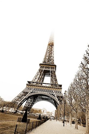 paris sepia - The Eiffel Tower in Paris, France. Sepia tone. Copy space. Stock Photo - Budget Royalty-Free & Subscription, Code: 400-04968876