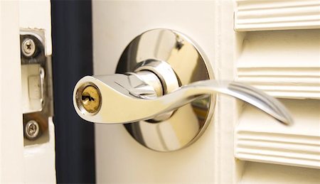 simsearch:400-04617631,k - Door Handle  Chrome Door Knob  Focus on keyhole Stock Photo - Budget Royalty-Free & Subscription, Code: 400-04969057