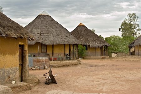 poor africans - Poverty face of a real African village, Kalahari area, no what is presented in the tourist tours Stock Photo - Budget Royalty-Free & Subscription, Code: 400-04961176