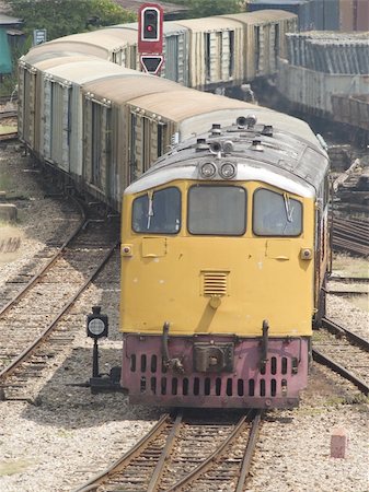 Freight train arriving at a railway station. Hat Yai, Thailand. Stock Photo - Budget Royalty-Free & Subscription, Code: 400-04963181