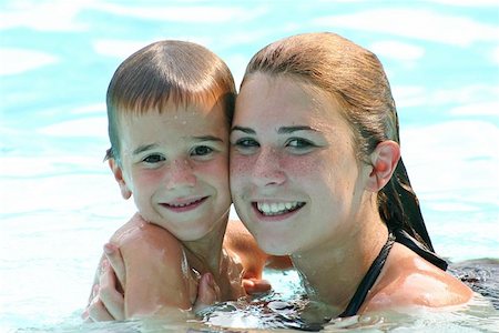 two kids in pool Stock Photo - Budget Royalty-Free & Subscription, Code: 400-04974419