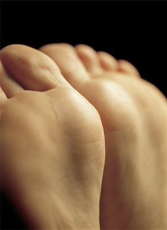 Shallow depth-of-field image of the bottom of a females feet. Stock Photo - Budget Royalty-Free & Subscription, Code: 400-04975020