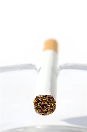 simsearch:400-06761272,k - Cigarette in ash tray Stock Photo - Budget Royalty-Free & Subscription, Code: 400-04976006