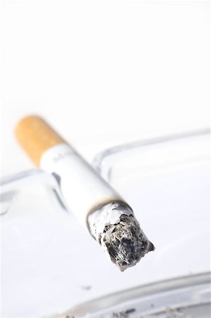 simsearch:400-06761272,k - Cigarette in ash tray Stock Photo - Budget Royalty-Free & Subscription, Code: 400-04976009