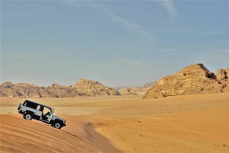 dune driving - A sliver SUV in the desert Stock Photo - Budget Royalty-Free & Subscription, Code: 400-04976021