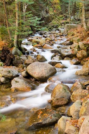 simsearch:400-05718920,k - Stream meandering through boulder filled rock field. Stock Photo - Budget Royalty-Free & Subscription, Code: 400-04979604