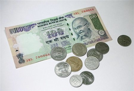 Closeup of one hundred rupee note and coins of different denominations Stock Photo - Budget Royalty-Free & Subscription, Code: 400-04970726