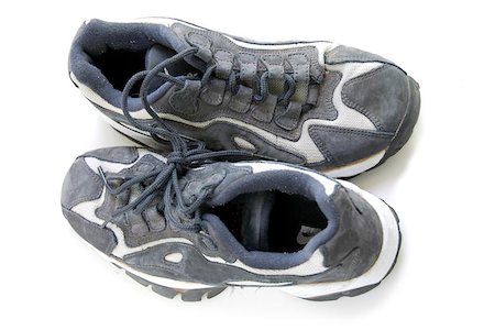 simsearch:400-05318197,k - Worn running shoes on white background Foto de stock - Super Valor sin royalties y Suscripción, Código: 400-04970847