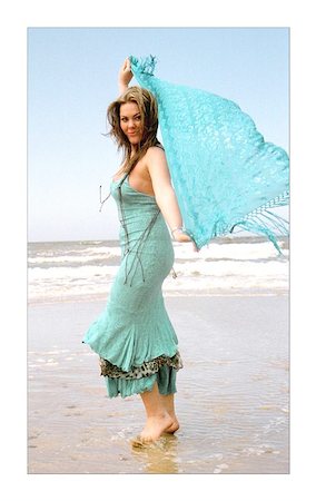 photo of a woman dancing on the beach Stock Photo - Budget Royalty-Free & Subscription, Code: 400-04972830