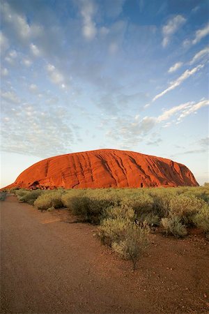 simsearch:400-04698881,k - Uluru early in the morning as the sun turns it bright red. Stock Photo - Budget Royalty-Free & Subscription, Code: 400-04973588