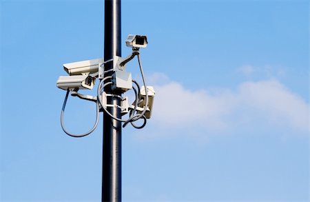 A series of security cameras on a pole. Stock Photo - Budget Royalty-Free & Subscription, Code: 400-04984134