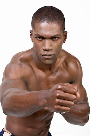 skinny man muscle pose - African American Athlete shows some muscle Foto de stock - Super Valor sin royalties y Suscripción, Código: 400-04987133