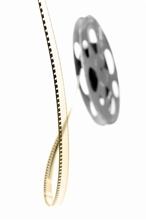 simsearch:649-07279862,k - Retro film reel isolated on white background Stock Photo - Budget Royalty-Free & Subscription, Code: 400-04988968