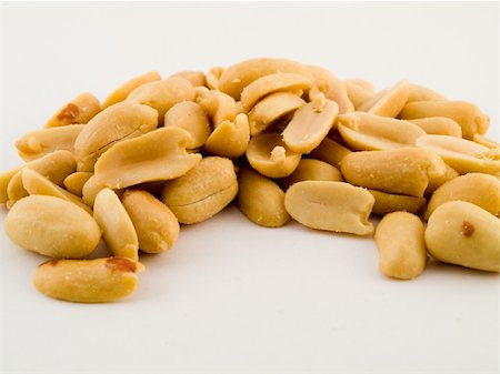 simsearch:400-04833195,k - Stact Pile of Peanuts On White Background No Shells Stock Photo - Budget Royalty-Free & Subscription, Code: 400-04994295
