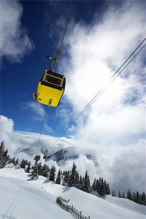 simsearch:400-03985663,k - Ski lift during winter time in Austrian Alps Stock Photo - Budget Royalty-Free & Subscription, Code: 400-04994799