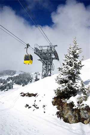 simsearch:400-03985663,k - Ski lift during winter time in Austrian Alps Stock Photo - Budget Royalty-Free & Subscription, Code: 400-04994800