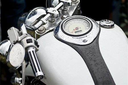 simsearch:400-05017762,k - close up of the classical black and white finished motorcycle Stock Photo - Budget Royalty-Free & Subscription, Code: 400-04995191
