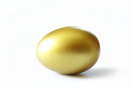 golden egg is isolated on a white background Stock Photo - Budget Royalty-Free & Subscription, Code: 400-04995613