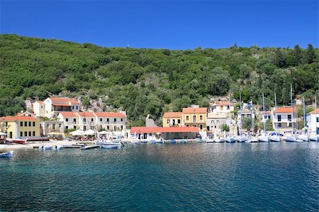 Harbor of Fiskardo on the Ionian island of Lefkas Greece Stock Photo - Budget Royalty-Free & Subscription, Code: 400-04996197