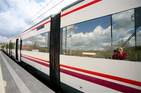 Electric train with reflections in windows. Spain Stock Photo - Budget Royalty-Free & Subscription, Code: 400-04997509