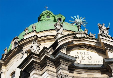 statues on building top - Fragment of Dominican cathedral church top  (Lvov-City, Ukraine) Stock Photo - Budget Royalty-Free & Subscription, Code: 400-04991216