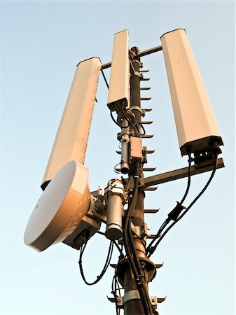 sender - GSM mobile antenna detail against a blue sky Stock Photo - Budget Royalty-Free & Subscription, Code: 400-04991537