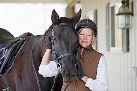 Woman Posing With Her Horse Stock Photo - Budget Royalty-Free & Subscription, Code: 400-05004140