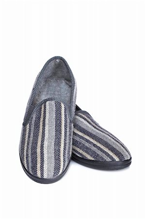 simsearch:857-03192847,k - A pair of male slippers isolated on white background Foto de stock - Super Valor sin royalties y Suscripción, Código: 400-05005095