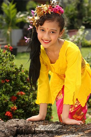 Balinese  Girl In Traditional Dress Stock Photo - Budget Royalty-Free & Subscription, Code: 400-05006650