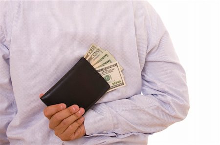 A man hiding a wallet on his back Stock Photo - Budget Royalty-Free & Subscription, Code: 400-05003438