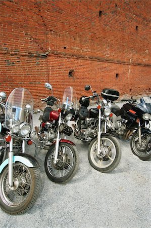 simsearch:400-05017762,k - Four motorcycles on a background of a brick wall Stock Photo - Budget Royalty-Free & Subscription, Code: 400-05016352