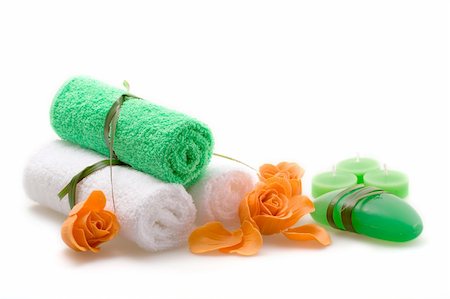 simsearch:400-04335125,k - Spa concept of green color: the towel, soap and candles over white background Stock Photo - Budget Royalty-Free & Subscription, Code: 400-05017919