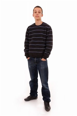 simsearch:400-04332775,k - Young man standing with hands in pockets Stock Photo - Budget Royalty-Free & Subscription, Code: 400-05010324