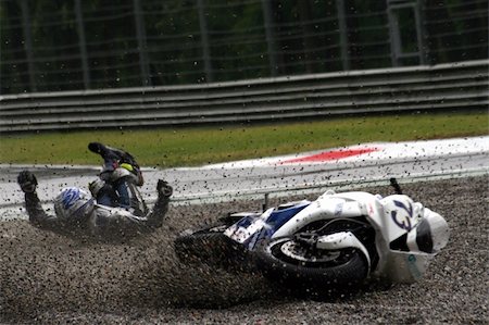 Moto crash on a wet track Stock Photo - Budget Royalty-Free & Subscription, Code: 400-05011174