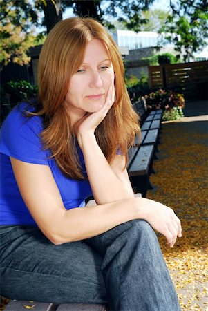 simsearch:400-04283915,k - Mature woman looking sad and stressed sitting on a park bench Stock Photo - Budget Royalty-Free & Subscription, Code: 400-05012644