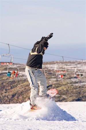 simsearch:400-03985663,k - Men jumping on a snowboard Stock Photo - Budget Royalty-Free & Subscription, Code: 400-05025244