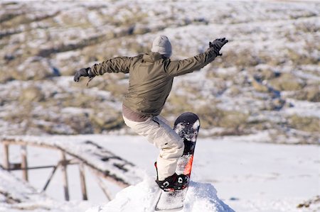 simsearch:400-03985663,k - Men jumping on a snowboard Stock Photo - Budget Royalty-Free & Subscription, Code: 400-05025245
