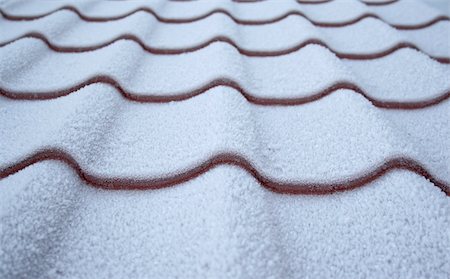 Roof from a metal tile covered by hoarfrost Stock Photo - Budget Royalty-Free & Subscription, Code: 400-05027334