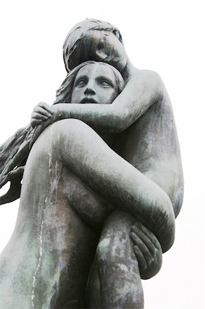 Child holding onto a sibling or a young mother at Vigeland Sculpture Park, Oslo Norway.  (Frognerparken) Stock Photo - Budget Royalty-Free & Subscription, Code: 400-05029706