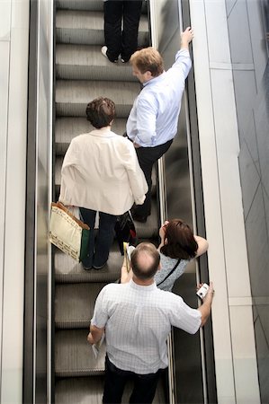 People ascending escalators and stairs Stock Photo - Budget Royalty-Free & Subscription, Code: 400-05020909